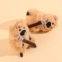 A large plush smiley face capybara pendant