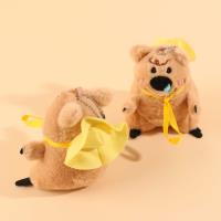 A large plush brown bear pendant