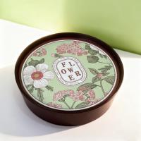 A red-brown circular storage box