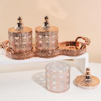 Ensemble de petits pots hermétiques Dior en or rose avec motif de rose, référence 6294-9C.