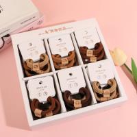 The K88045/46 leather-tag towel ring set with elastic bands