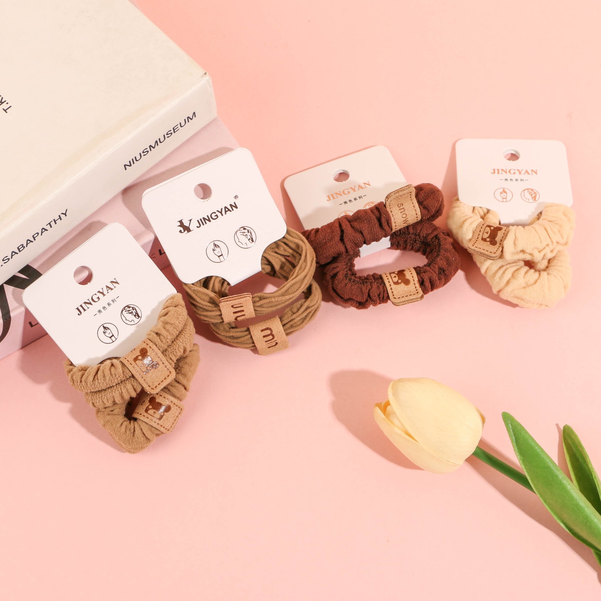 The K88047 milk coffee-colored leather label towel ring set with elastic bands