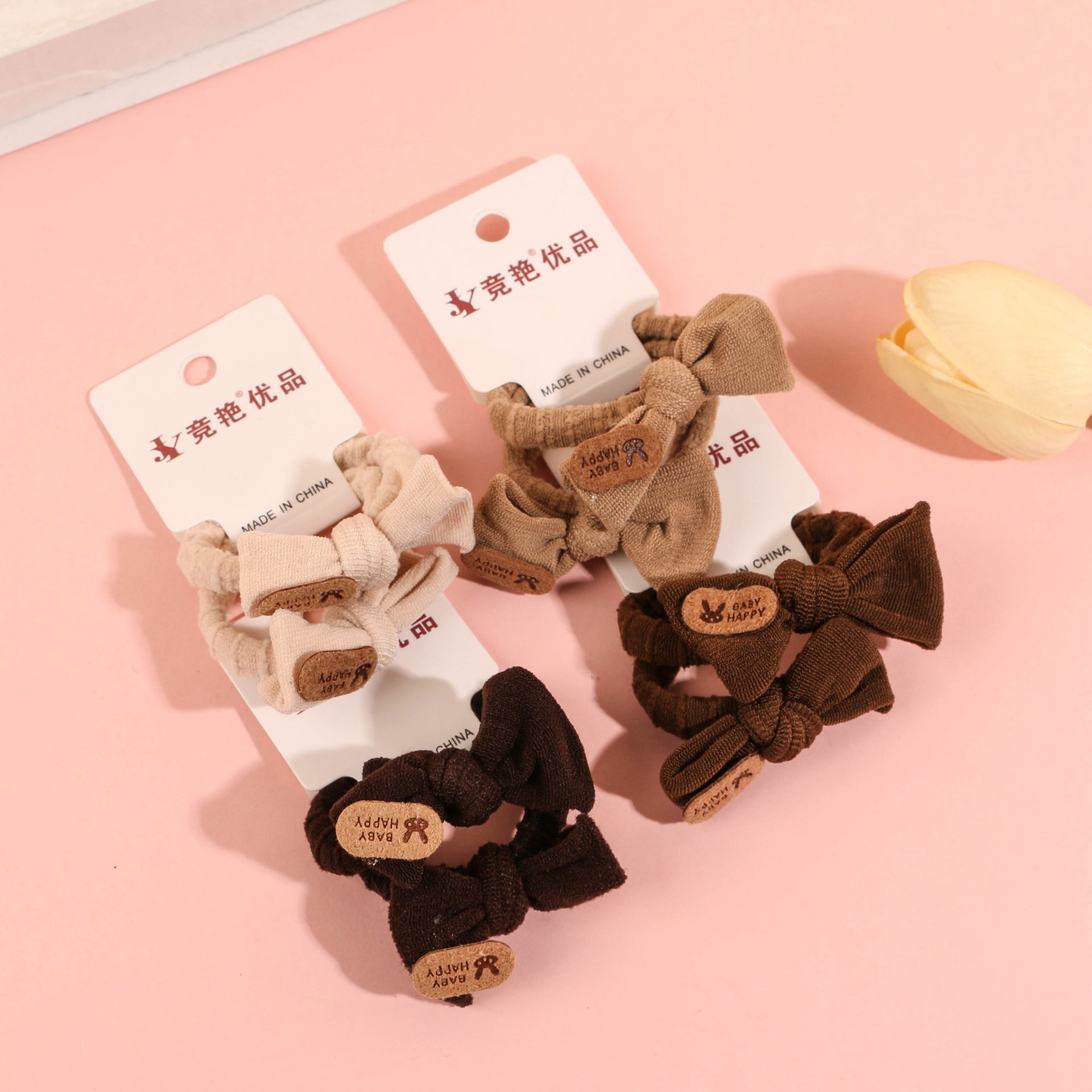 Two leather tag bow tie towel rings from JY-25